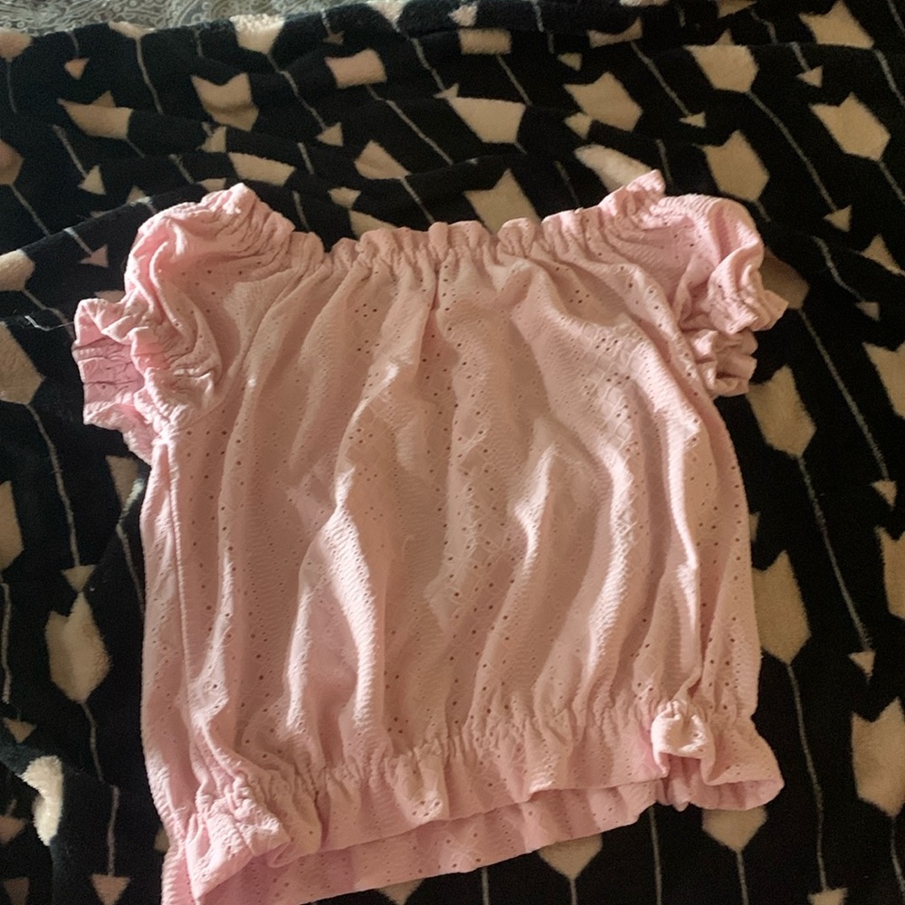 A pink crop top very stretchy